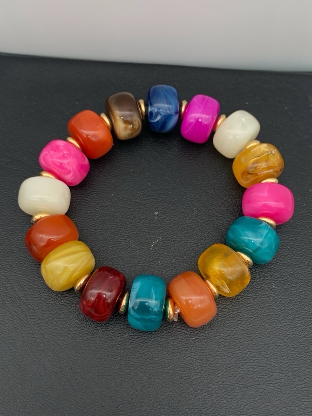 Colorful marbled acrylic Bead Stretch Bracelet with gold tone accents Multicolor